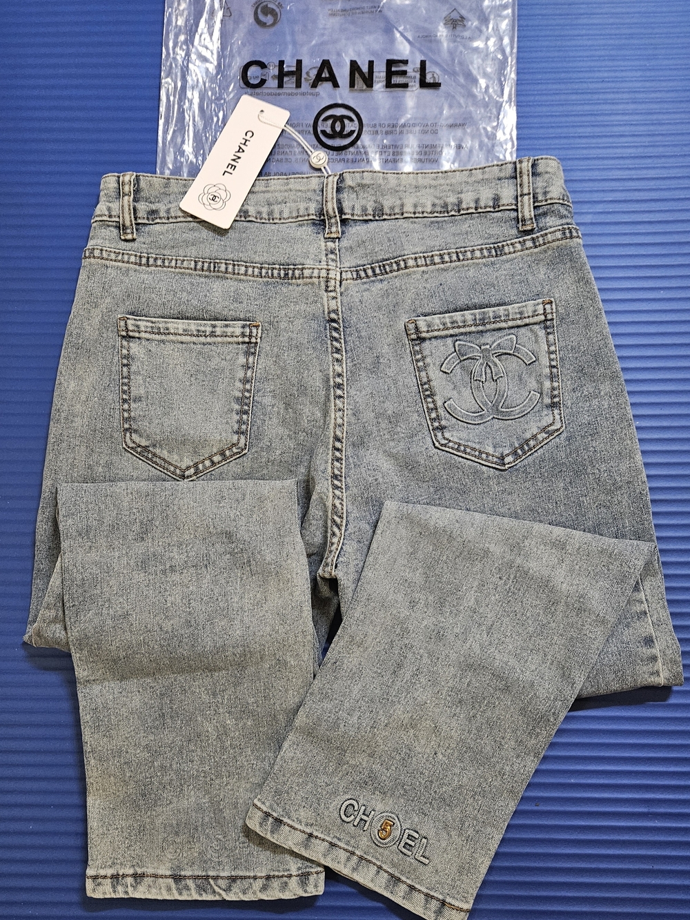 Light Blue High-Rise Women’s Jeans with Gold Button Accent - Picture 9 of 9